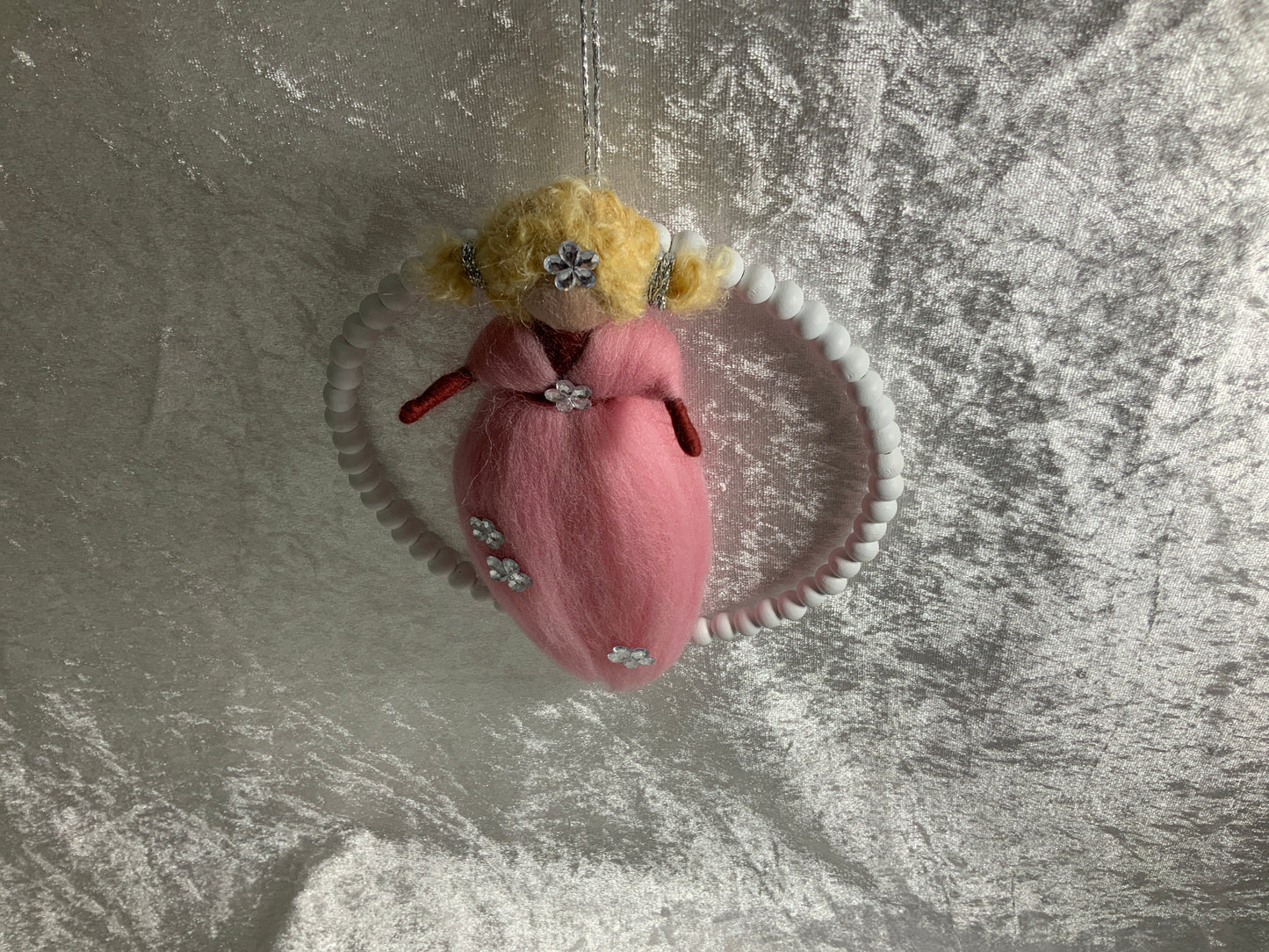 Blumenmädchen aus Merinowolle in Rosa