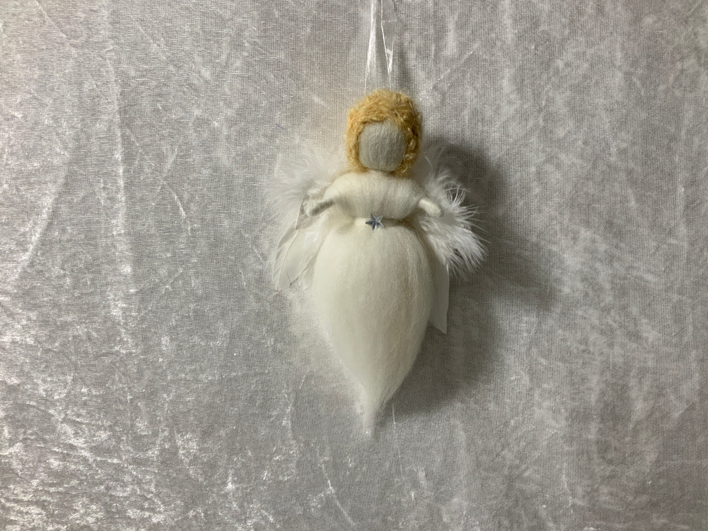 Handgefertigter Beschützer aus Merinowolle