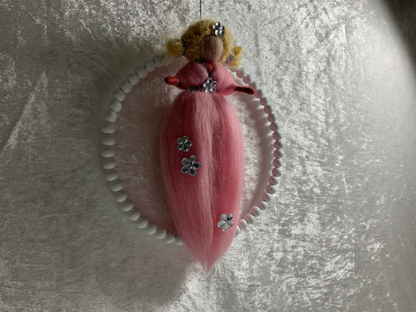 Blumenmädchen aus Merinowolle in Rosa