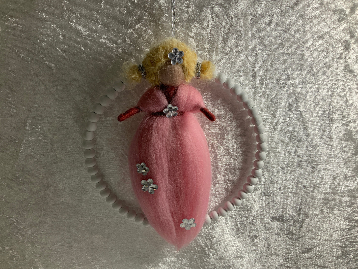 Blumenmädchen aus Merinowolle in Rosa