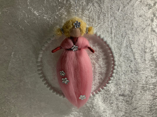 Blumenmädchen aus Merinowolle in Rosa