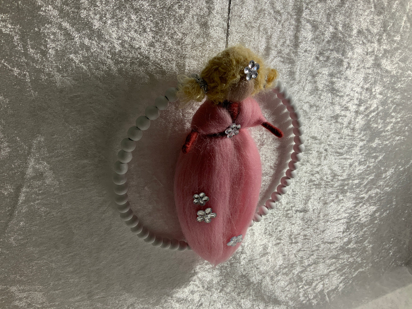 Blumenmädchen aus Merinowolle in Rosa